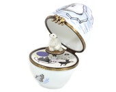 Polar bear music box. Hand-painted porcelain Limoges music egg with polar bear.