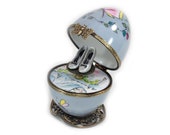 Grey Romantic French waltz in a Music egg hand-painted Limoges. pink butterfly paint. Handcraft in France. porcelain shoes miniatures.