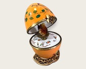 squirrel. French Limoges music egg. Dark Orange Butterly. Schubert Waltz melody. customizable object for romantic gift