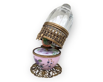 Handcrafted musical egg with a singing robin, elegant combination of Limoges porcelain and crystal. romantic unique gift.