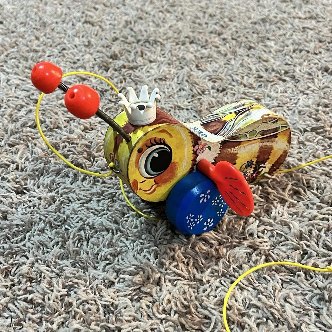 jouet à tirer Queen buzzy Fisher price