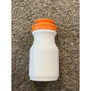 Vintage Milk Glass Tang Jar Canister Embossed Daisies Orange Plastic Lid