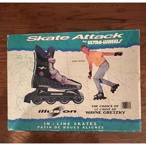 May include: Box for Skate Attack inline skates by Ultra-Wheels. The box features a black and purple inline skate illustration and a graphic of Wayne Gretzky skating. Text includes "Skate Attack", "Ultra-Wheels", and "The Choice of Wayne Gretzky."