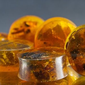 Peoples Jewelry - Reconstituted Amber Double Flared Plugs - Priced per pair.