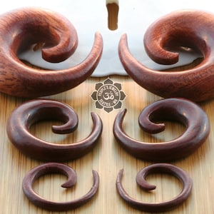 Peoples Jewelry - Bloodwood spirals, priced per pair.