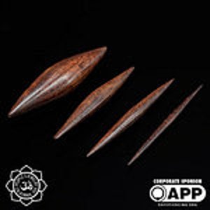 May include: Set of five wooden tools, each with a pointed tip and a slightly curved shape. The tools are made of dark brown wood and are arranged in order of size, with the largest tool at the top and the smallest tool at the bottom.