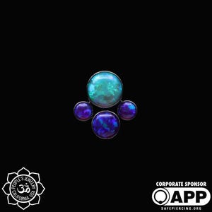 May include: A five-stone opal cluster body jewelry piece with a large teal opal in the center and four smaller purple opals surrounding it.
