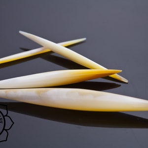 Peoples Jewelry - Mother of Pearl Septum - Spike - Priced per piece.
