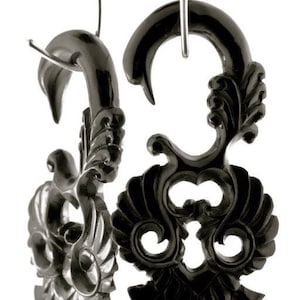 carved from Buffalo Horn SWANS  priced per pair