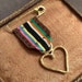 see more listings in the LOVE + justice medals section