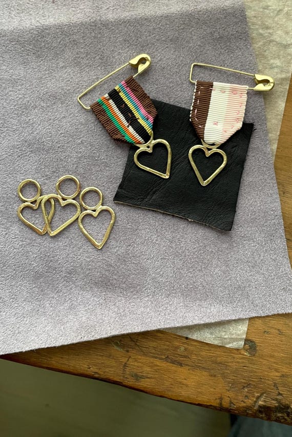 Love Badge lapel pins - hand wrought brass hearts + hand sewn ribbon - punk rock love by camille hempel design