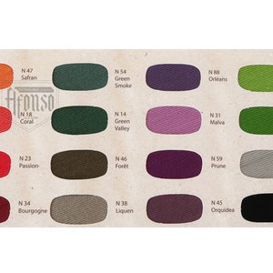May include: A color chart with 18 fabric swatches, each labeled with a number and a color name in French. The chart is titled "Afonso" and is a guide to different colors of fabric.