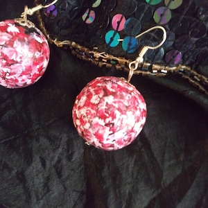 Unique original hand painted with an acrylic paint wooden ball earrings. 1&quot;in and 1/8&quot;in diameter. Light weight. Polished.