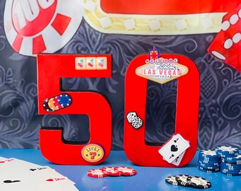 Fiesta del Casino Las Vegas decorada con números 21, 40, 50, 60, fiesta de juegos de azar