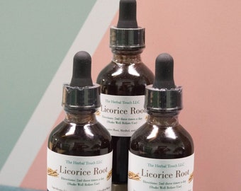 May include: Three glass bottles of licorice root extract. Each bottle has a black dropper top and a white label with the text "The Herbal Touch LLC" and "Licorice Root". The label also includes directions for use and a list of ingredients.