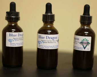 May include: Three brown glass bottles with dropper tops labeled "Blue Dragon" and containing a dark liquid. The bottles are on a black surface. The label includes directions to take 2nd and 3rd times a day and to shake well before use. The ingredients are listed as American Ginseng, Blue Vervain, Ashwagandha, Astragalus, Alcohol, and Distilled Water.