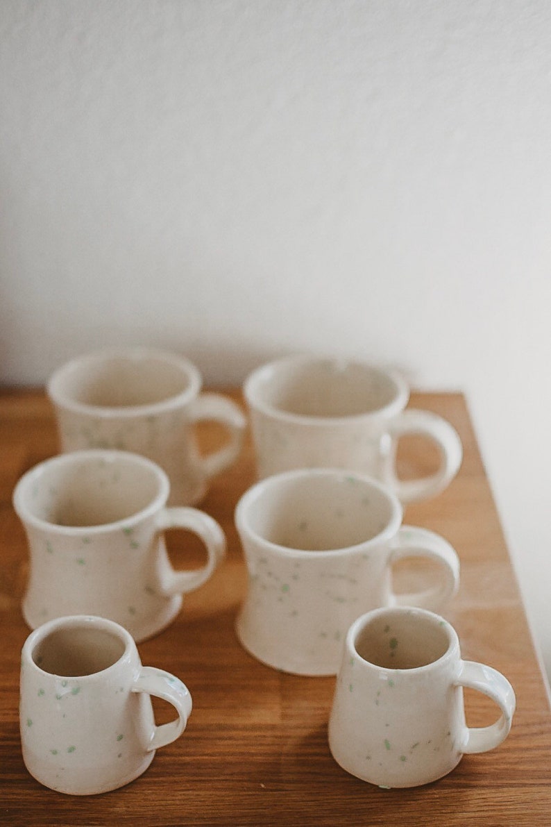 Medium green confetti ceramic mugs