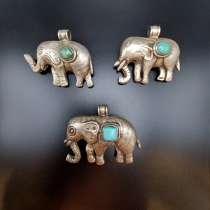 x1 Vintage Tibetan  Repousse Sterling Silver (??) Elephant Pendant w/ Inset Turquoise Stone