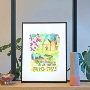 May include: A framed watercolor painting of a church and a building with the text "HEC" and "TOUY-EN-JOSAS". The painting is on a white background and is framed in black.