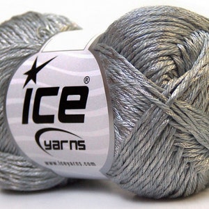 May include: A skein of silver metallic yarn with the label "ICE yarns" printed on it.
