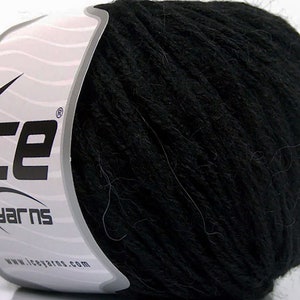 May include: A ball of black yarn with a white label displaying the "ice yarns" logo. The yarn has a soft, fluffy texture, suitable for knitting or crochet. The label also includes the website address.