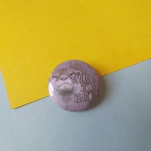 Otters Against Ableism Background 32mm Button Badge Pin Disabilities Invisible Chronic Illness Spoonie aquatic animal