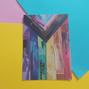 May include: A rectangular collage featuring a rainbow of colors, including purple, blue, green, yellow, and red. The artwork has a geometric design with a dark triangle at the top. The background is a mix of pink, yellow, and blue.
