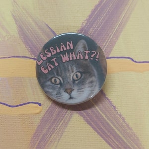Lesbians Eat What Funny Grey Cat Shocked Face Sapphic LGBTQIA Fun Novelty 32mm button badge pin Activism Activist Queer Joy Rights Community