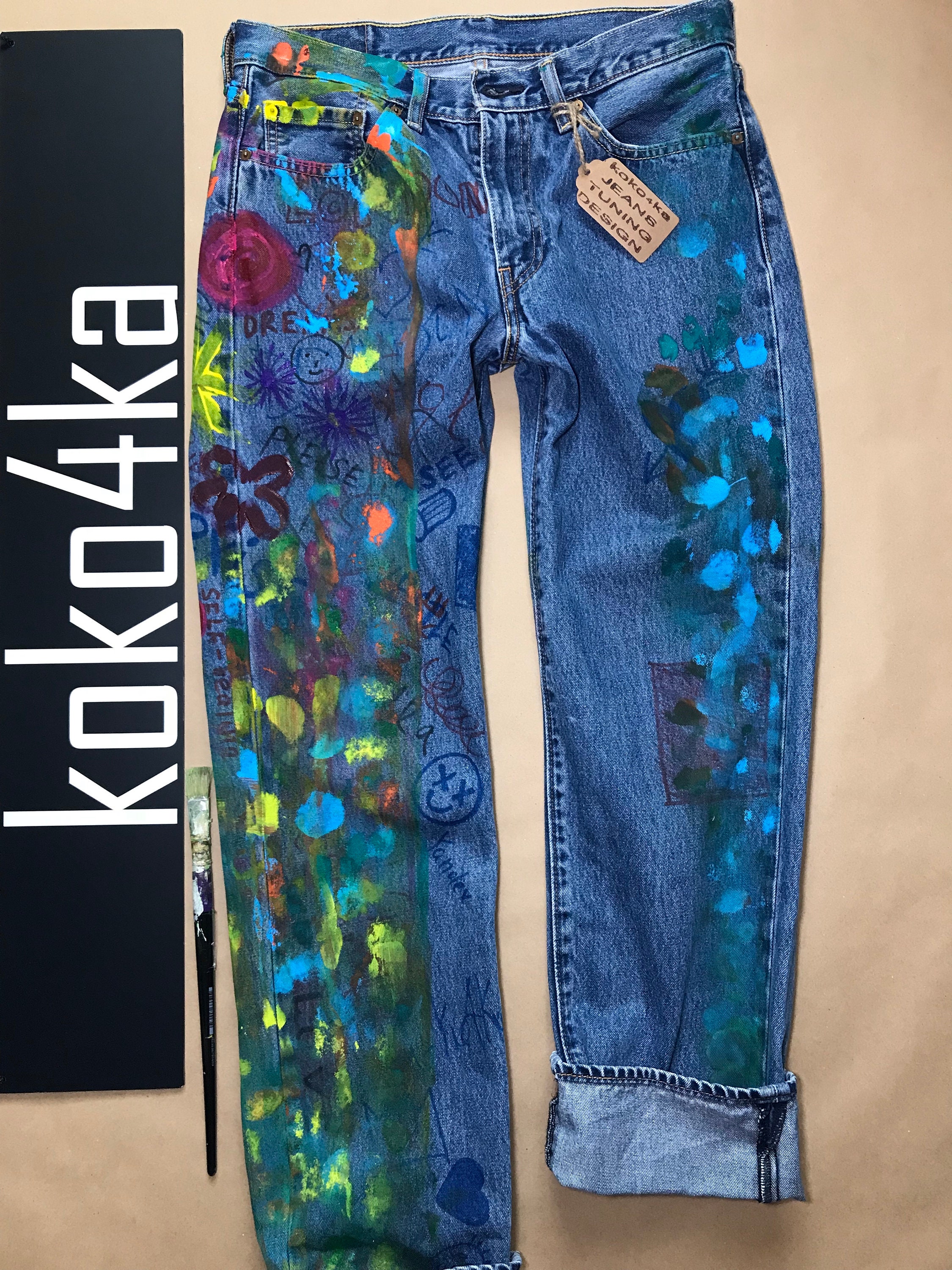 womens jeans with paint splatter
