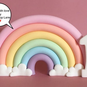 Large fondant 3d very pastel rainbow cake topper with number. Suits unicorn theme xx