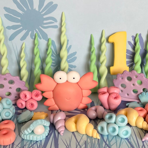 Fondant sea creature cake toppers. Clam shells, seaweed, crab. Birthday boy or girl decorations.