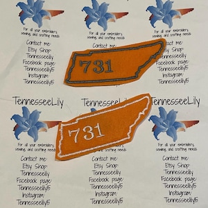 May include: Orange embroidered patch in the shape of Tennessee with the number 731. The patch is surrounded by text and floral graphics. The text includes contact information for the Etsy shop Tennesseelily.