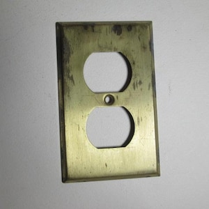 One Older Vintage Brass Electrical Outlet Plate Cover Semi Antique Shabby Sharp Corner  9541