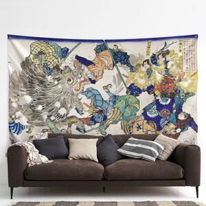May include: A tapestry featuring a colorful Japanese woodblock print depicting a scene of warriors battling a large, ferocious beast. The warriors are armed with spears and swords, and the beast is depicted with sharp teeth and claws. The tapestry is a vibrant and detailed work of art.