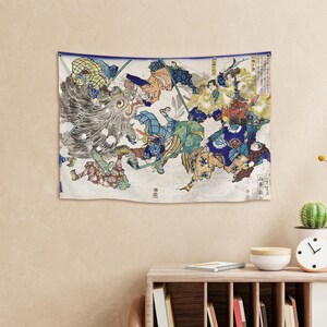 May include: A colorful Japanese woodblock print tapestry depicting a fierce mythical creature with warriors fighting it. The tapestry features a variety of colors, including red, blue, green, yellow, and white.