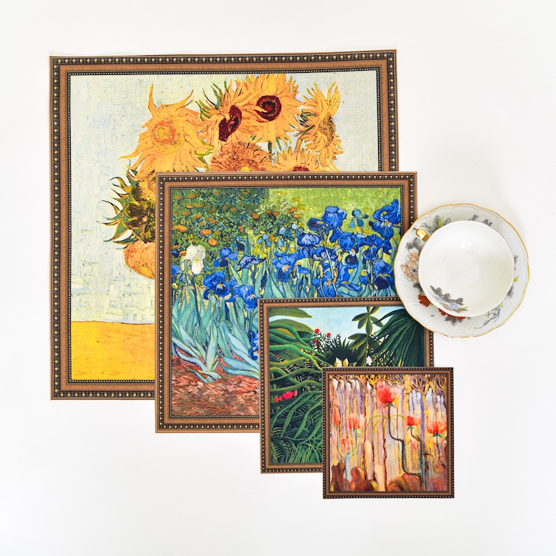 May include: Four framed art prints featuring different floral still life paintings. The top print shows a yellow sunflower bouquet, the second print shows blue irises, the third print shows a green and red tropical plant, and the bottom print shows a red poppy bouquet.