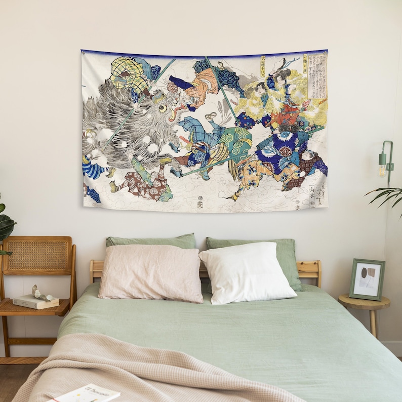 May include: A tapestry featuring a Japanese woodblock print depicting a scene of warriors battling a large, ferocious beast. The warriors are dressed in colorful armor and wielding swords and spears. The beast is depicted in shades of gray and white, with sharp teeth and claws. The tapestry is framed by a white border.