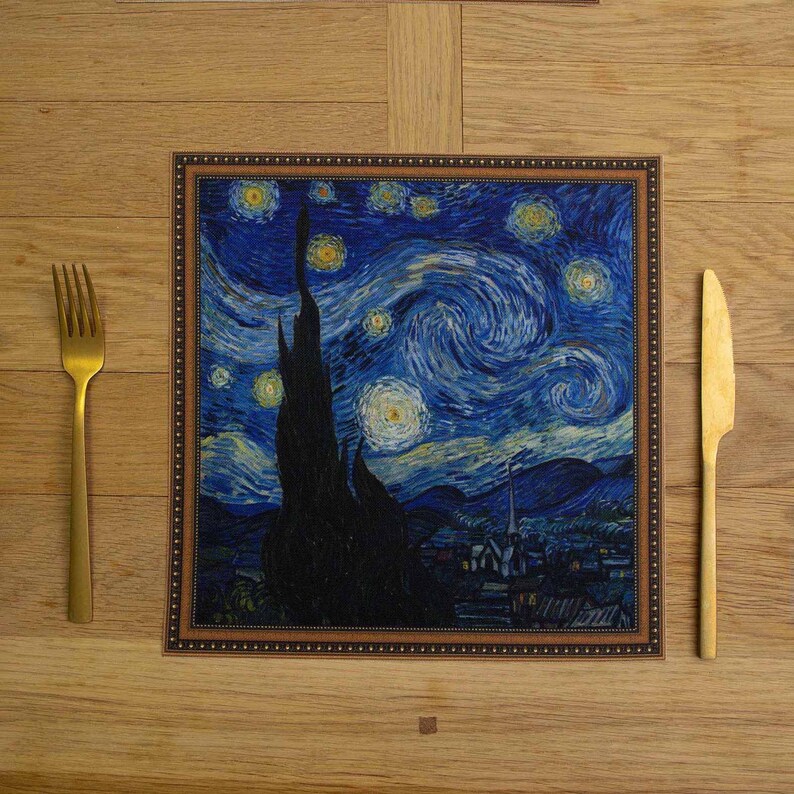 May include: A brown framed table mat with a printed image of Vincent van Gogh's "Starry Night" painting. The painting features a swirling blue sky with yellow stars and a dark cypress tree in the foreground.
