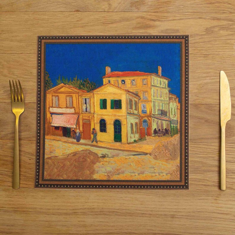 May include: A framed print of a painting depicting a yellow building with a blue sky in the background. The building has a red roof and a green door. There are people walking in front of the building.