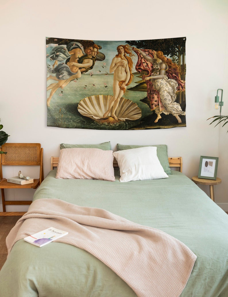 May include: A tapestry depicting the Birth of Venus, a famous Renaissance painting by Sandro Botticelli. The tapestry features a nude woman standing on a giant scallop shell, with two figures in the air above her and a figure on the right side of the image.