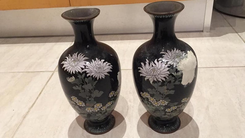 A pair of Japanese meiji period cloisonne vases