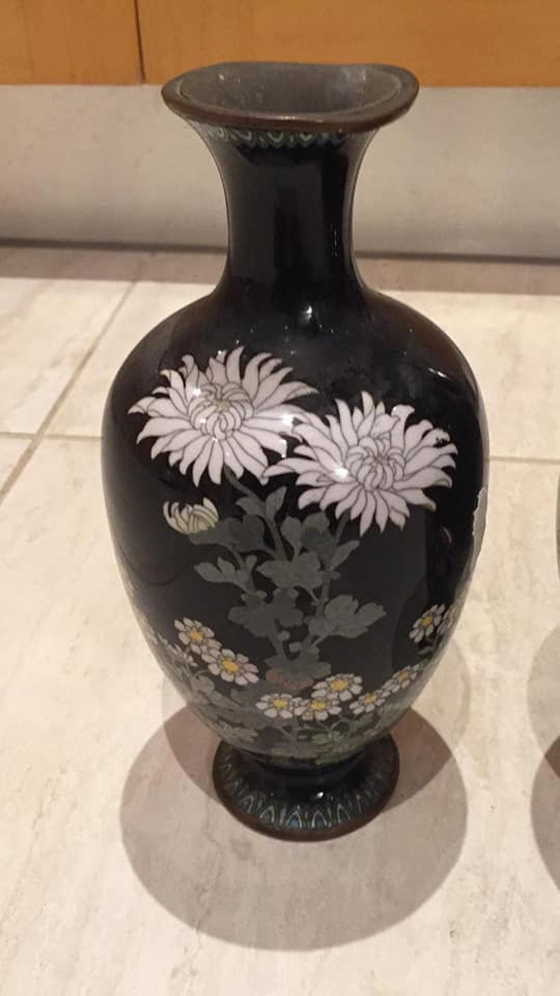 A pair of Japanese meiji period cloisonne vases