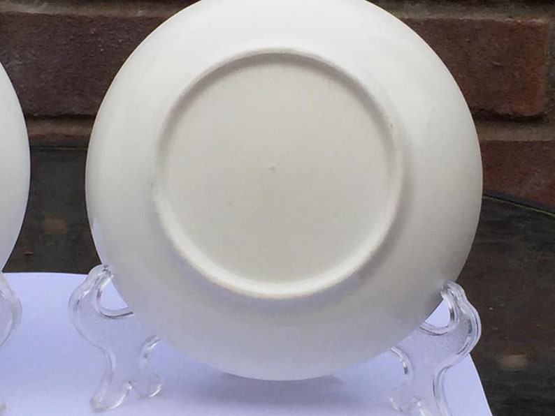 A pair of 19 Century german porcelain deer plates