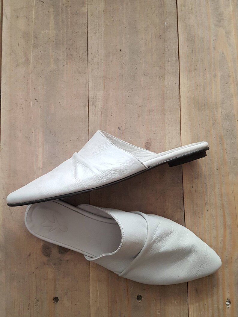 raid white flat mules