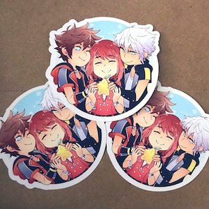 May include: Three circular stickers featuring a cartoon illustration of three characters. The characters are smiling and embracing, with one holding a yellow star. The stickers have a blue and white background.