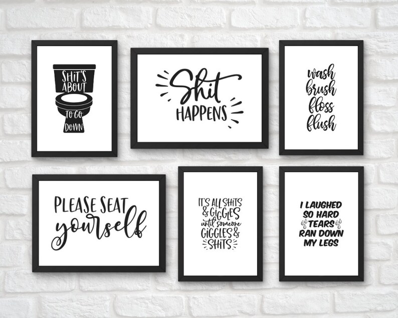May include: Six black framed prints with white backgrounds and black text. The prints feature humorous bathroom-themed sayings, including "Shit's About To Go Down", "Shit Happens", "Wash Brush Floss Flush", "Please Seat Yourself", "It's All Shits & Giggles Until Someone Giggles & Shits", and "I Laughed So Hard Tears Ran Down My Legs".