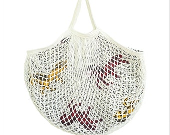 Mesh bag with wax fabric lining.