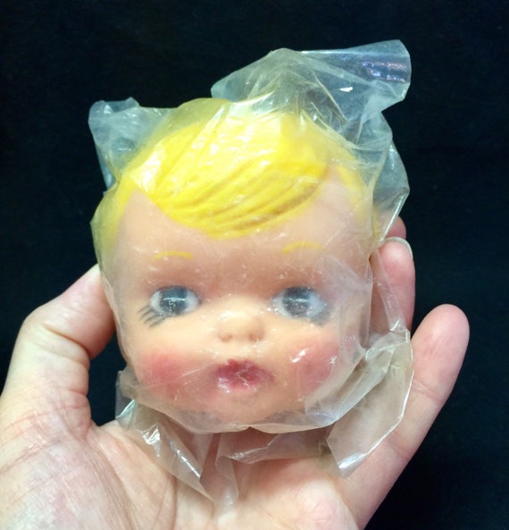 old doll heads