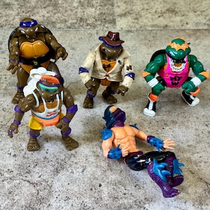 Vintage 1990s TMNT Action Figures – Lot of 5 Ninja Turtles & Villain Shredder