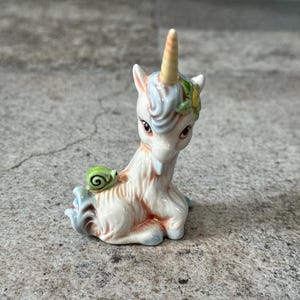 Vintage Ceramic Baby Unicorn Figurine with Snail – Pastel Iridescent Fantasy Decor – Kawaii Collectible